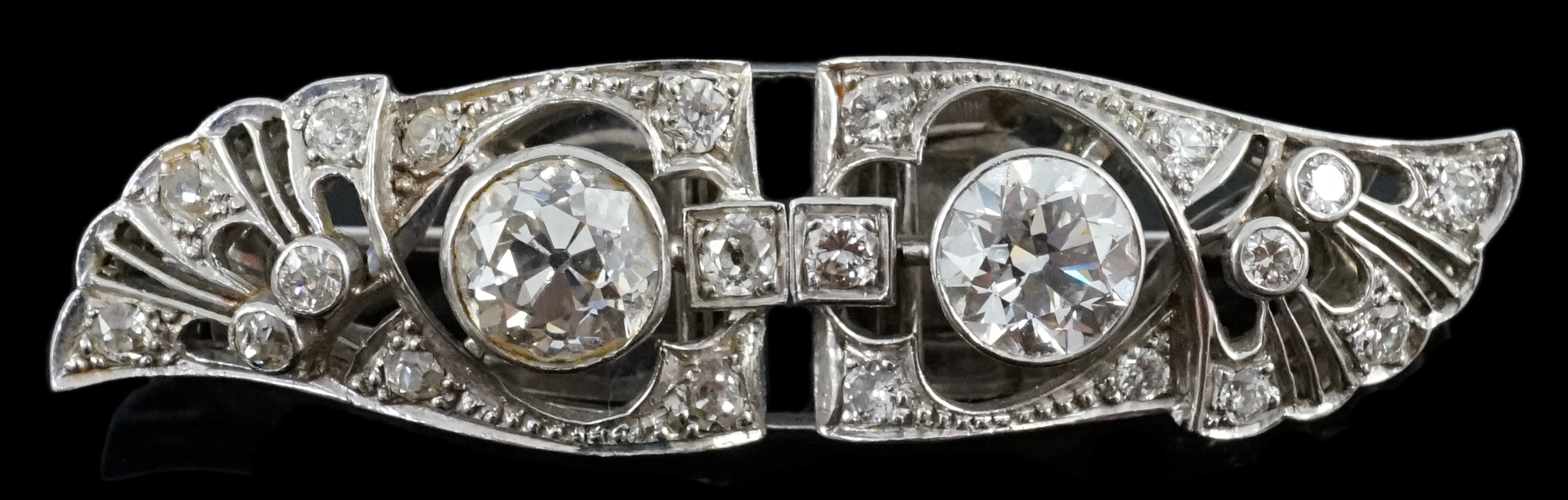 A good Art Deco platinum and diamond cluster set double clip brooch